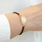 دستبند چرم و طلا زنانه
